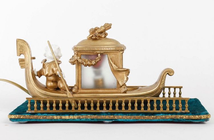 A Romantic Biscuit and Art Nouveau Gilt Metal Lamp