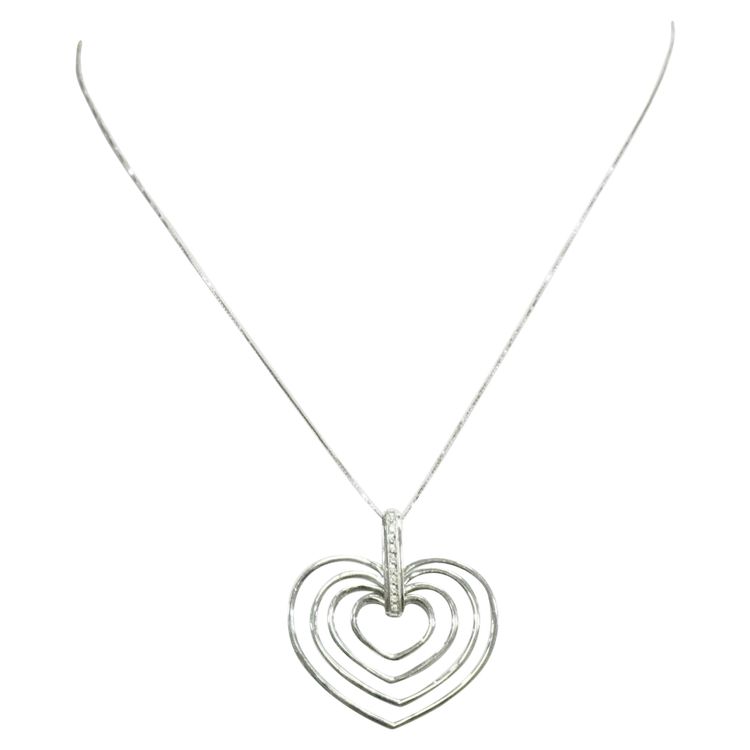 Collana in oro bianco con 4 cuori