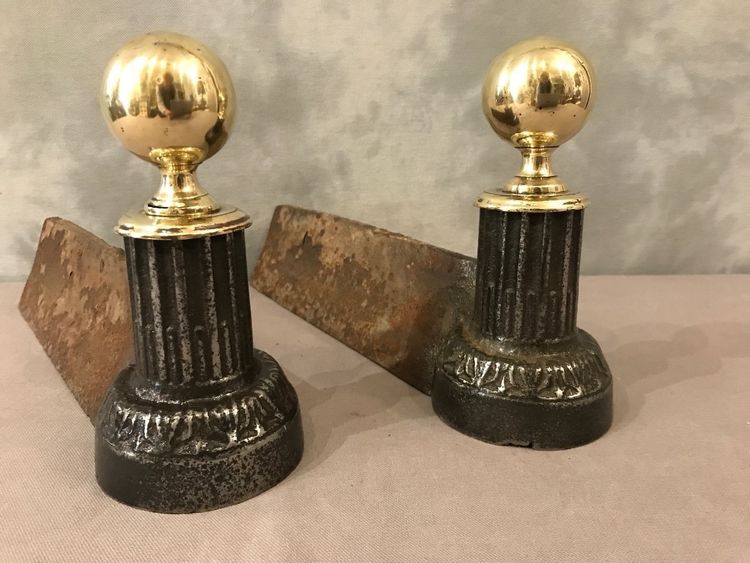 Pair of 19th century cast iron and brass andirons