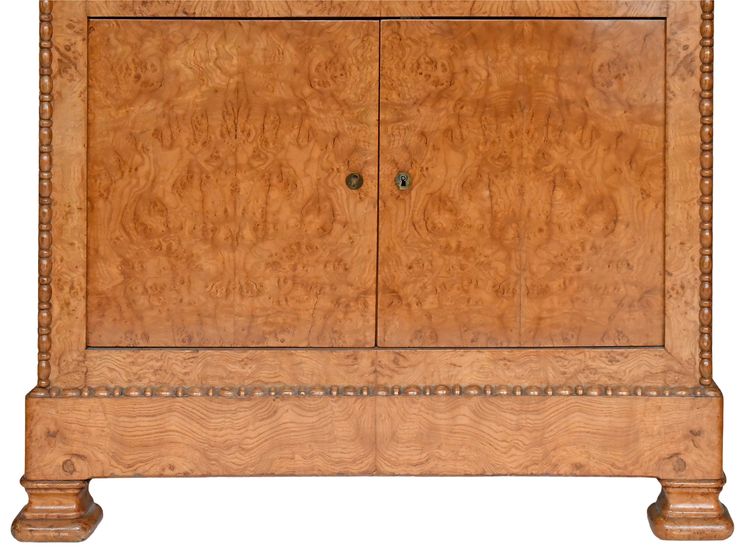 Secrétaire en placage de bois de loupe d'époque Restauration