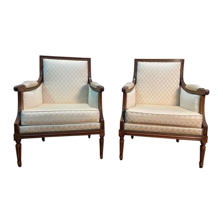 Paire de bergères de style Louis XVI