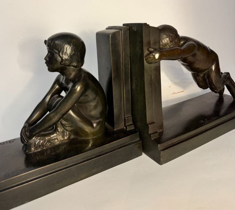 Coppia di fermalibri ArtDeco - Piccoli fauni in bronzo - Paul Silvestre - Susse frères