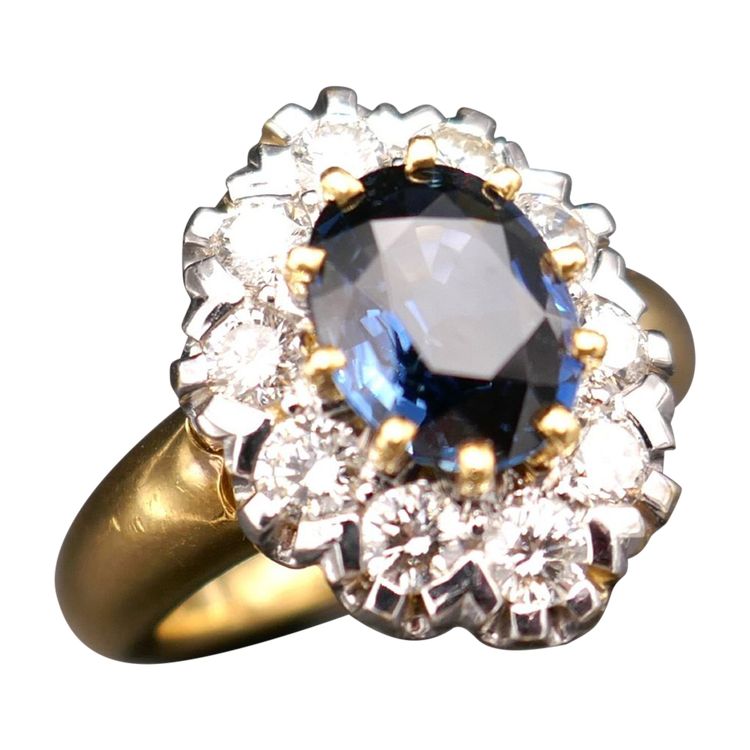 Anello con zaffiro da 1,95 carati e diamante da 1 carato, oro giallo 18 carati.