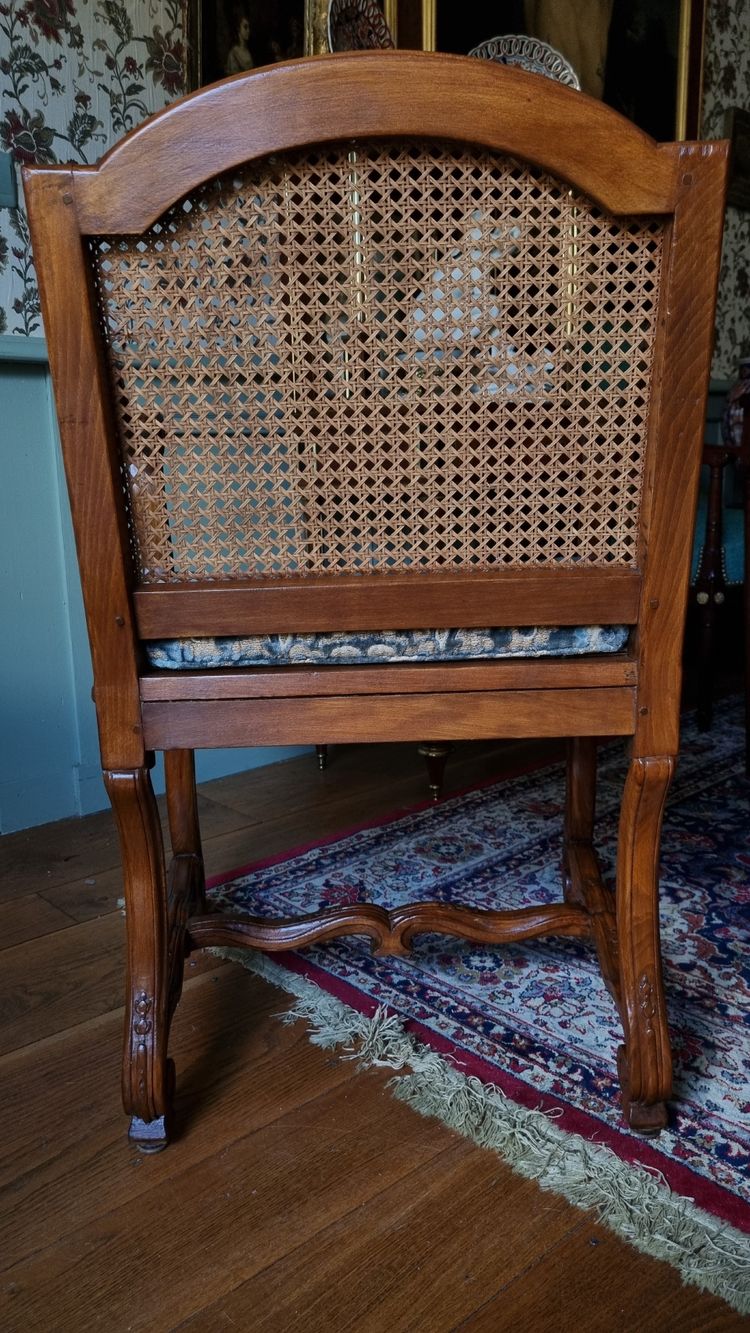 Pair of Louis XIV style caned armchairs. Late 19th century.