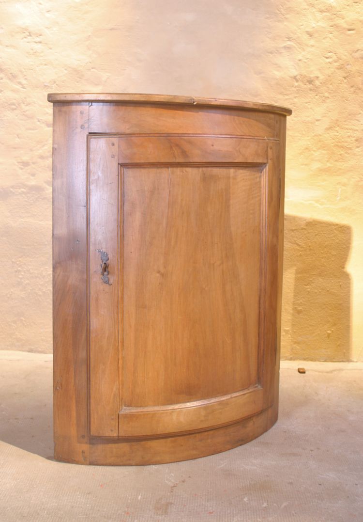 Curved walnut corner cupboard
