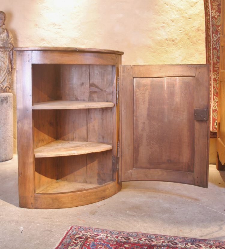 Curved walnut corner cupboard