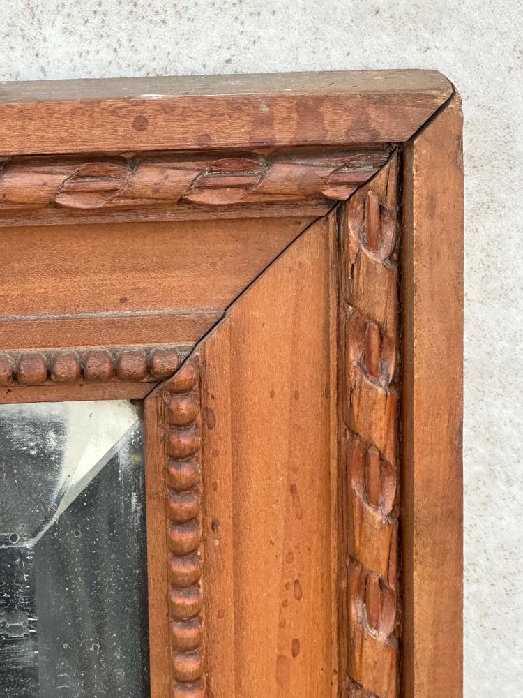 Specchio con cornice in legno