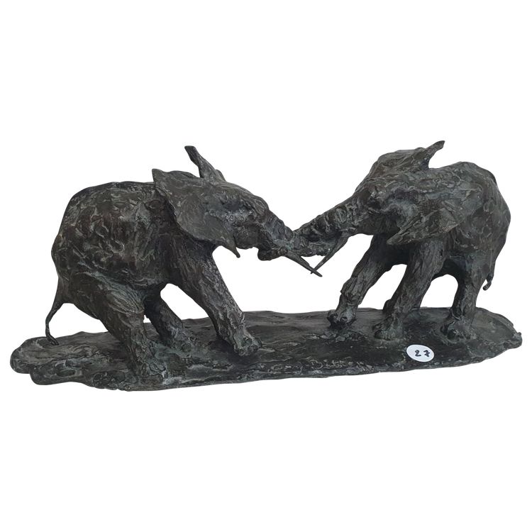 Giocatori di elefanti di bronzo
