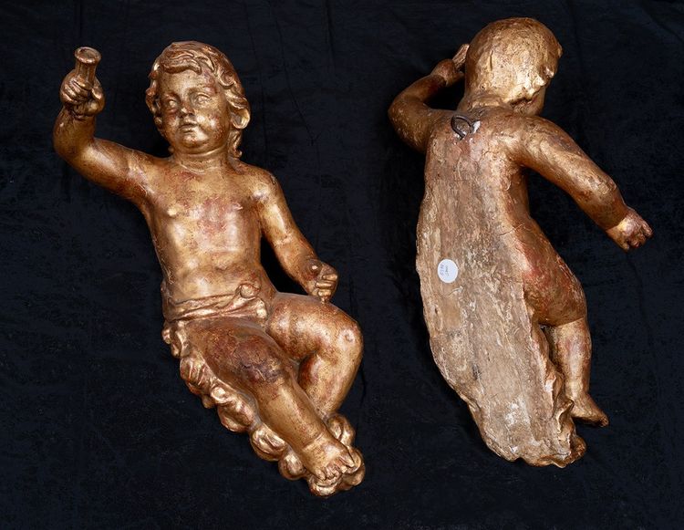 Paire d'angelots anciens mono-tronc en bois doré. Florence, fin du XVIIe siècle.