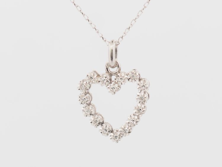 Ciondolo a forma di cuore in oro bianco e diamanti