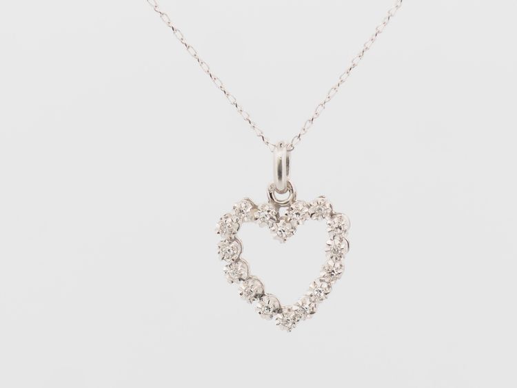 Ciondolo a forma di cuore in oro bianco e diamanti