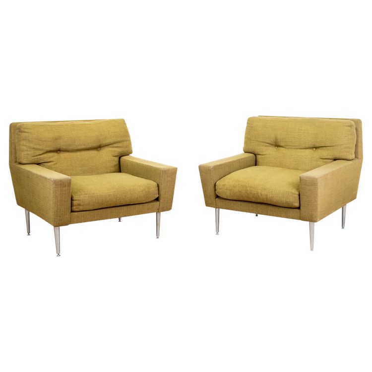 Coppia di poltrone anni '60 con gambe in metallo e forma geometrica