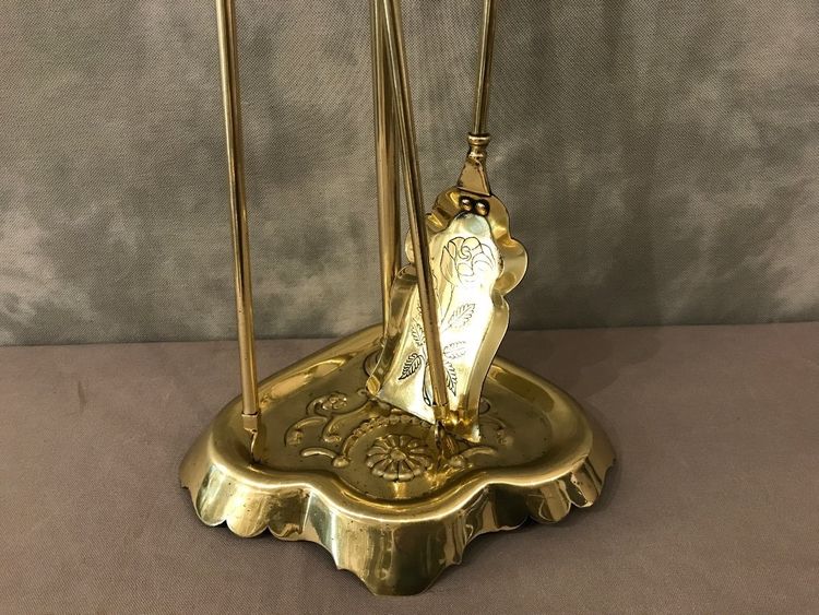 Antique fireplace set in polished and varnished brass from the 19th century