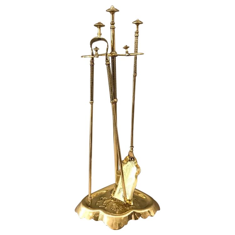 Antique fireplace set in polished and varnished brass from the 19th century
