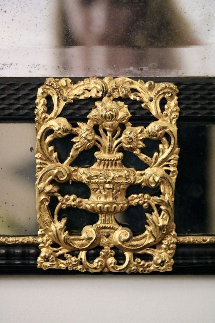 Repoussé Brass and Ebony Mirror