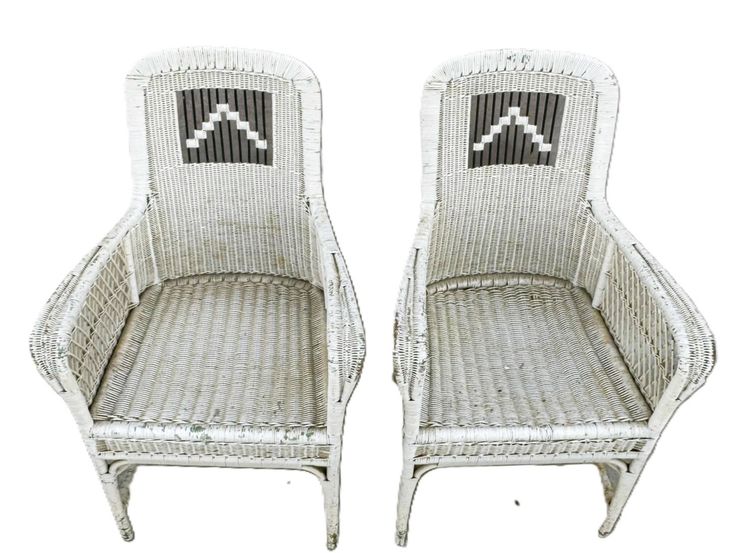 Coppia di poltrone in rattan
