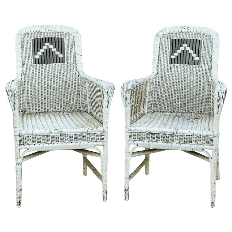Coppia di poltrone in rattan