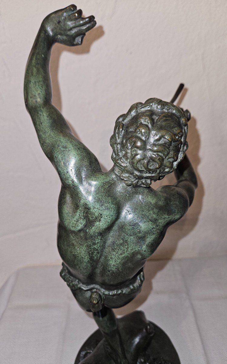 Scultura in bronzo raffigurante Bacco che danza e suona il flauto - XIX secolo -