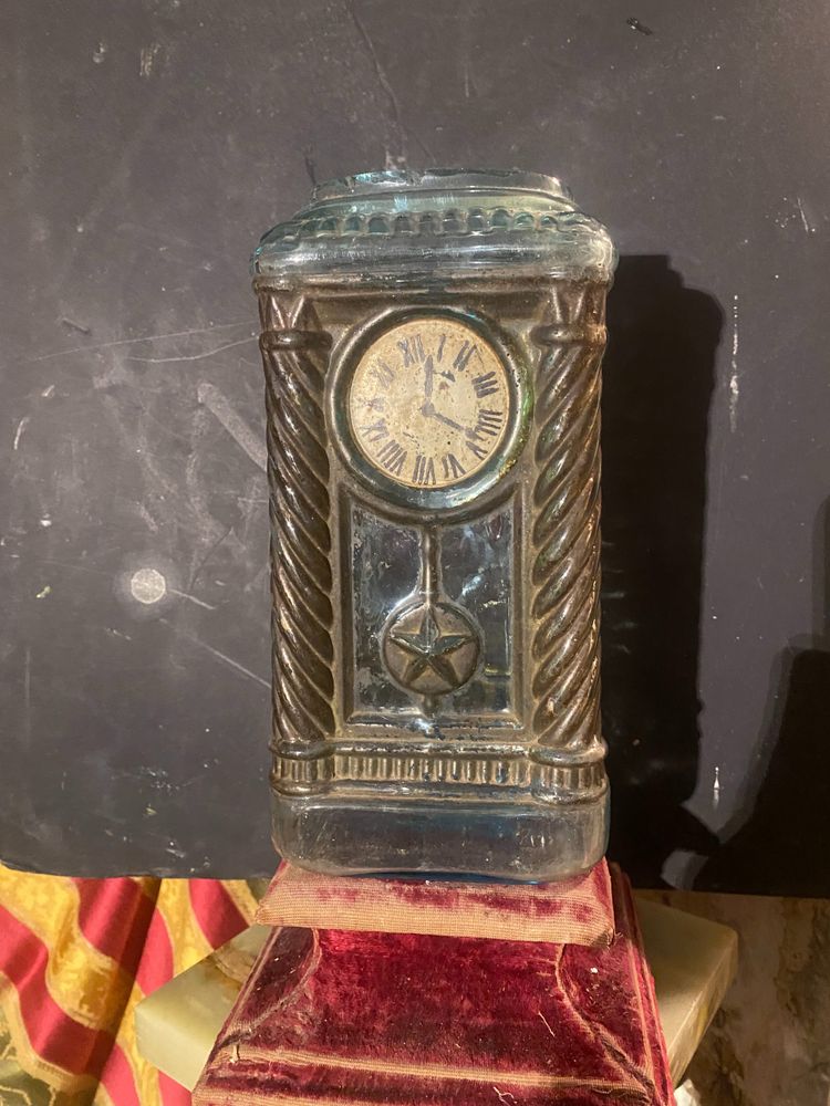 Rare molded glass bottle in imitation of a clock enhanced with painting, Napoleon III period