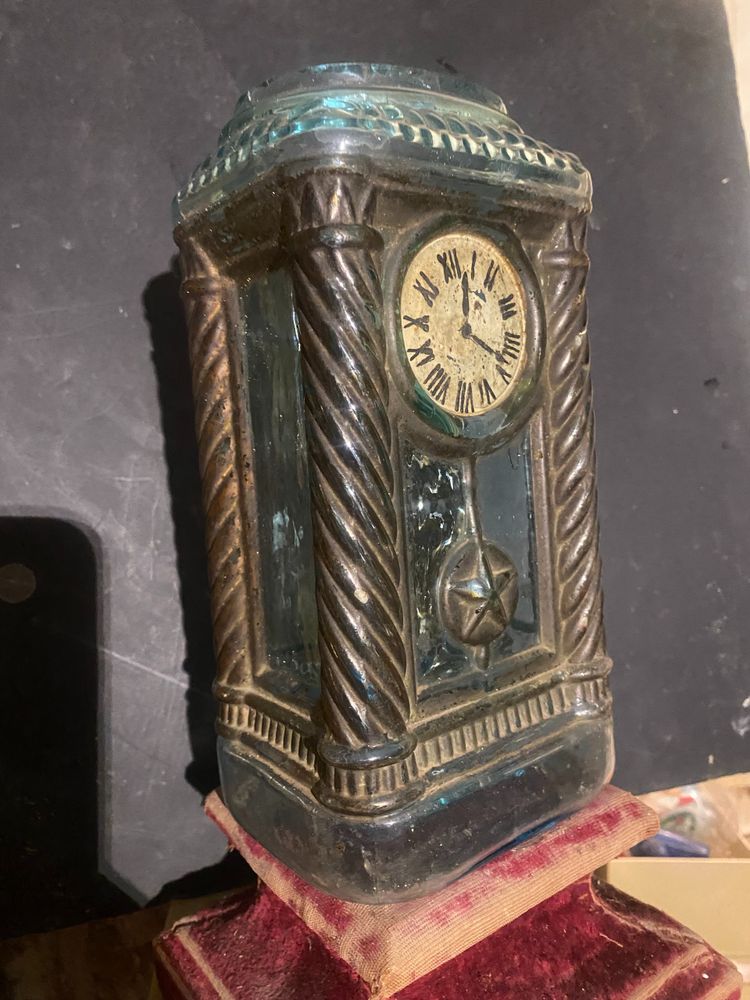Rare molded glass bottle in imitation of a clock enhanced with painting, Napoleon III period