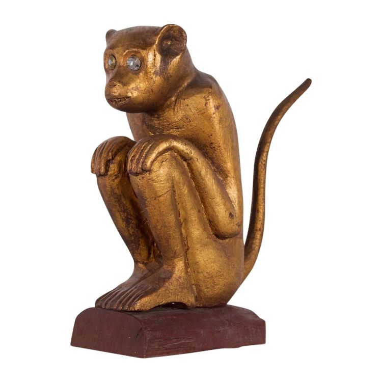 Figure rituelle de singe en bois doré