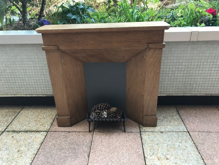 Small decorative solid wood mantel from the late 19th century