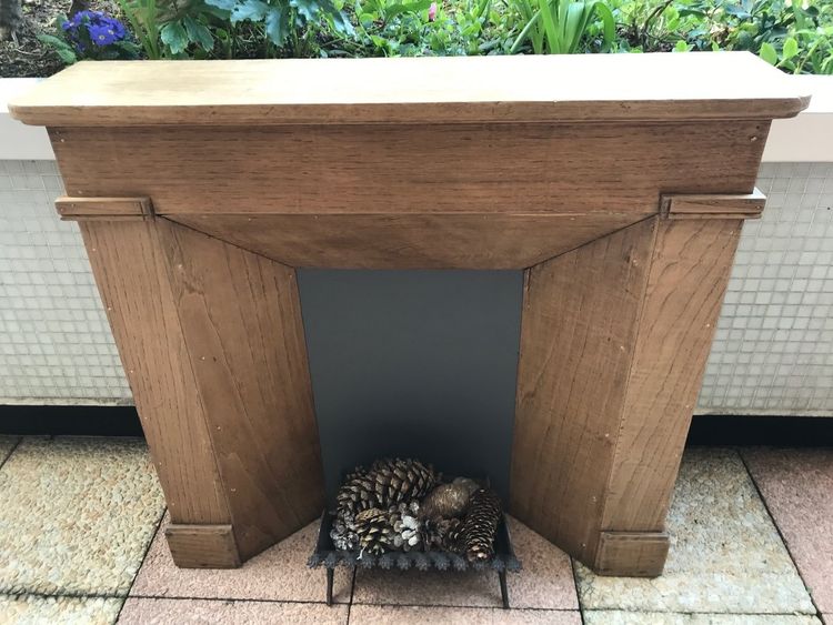 Small decorative solid wood mantel from the late 19th century