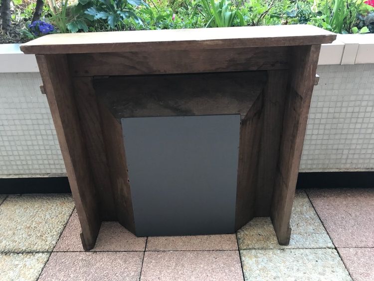 Small decorative solid wood mantel from the late 19th century