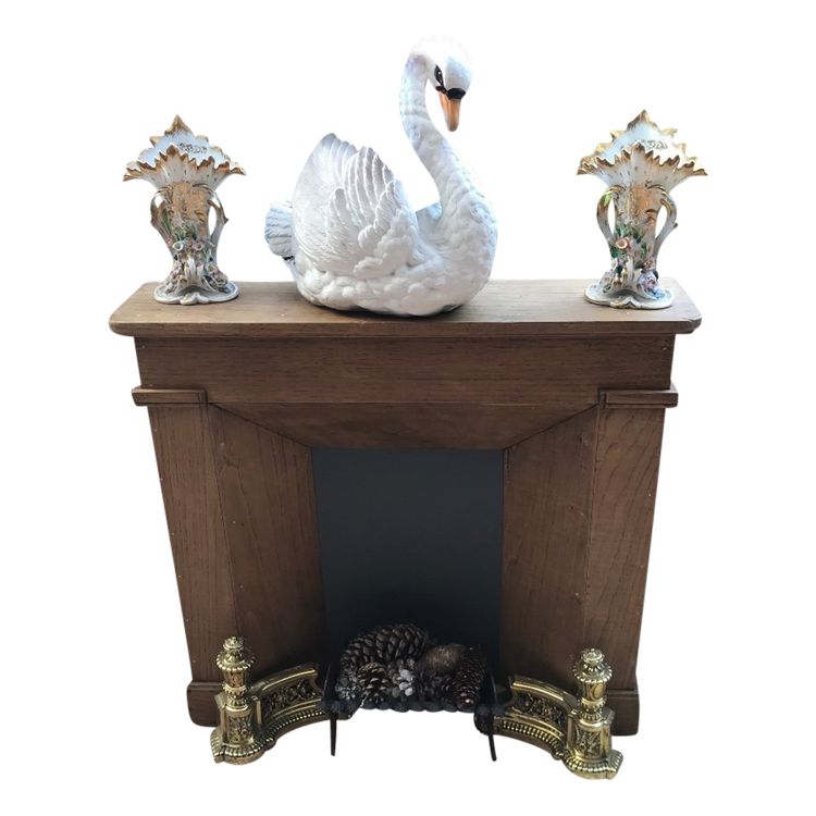 Small decorative solid wood mantel from the late 19th century