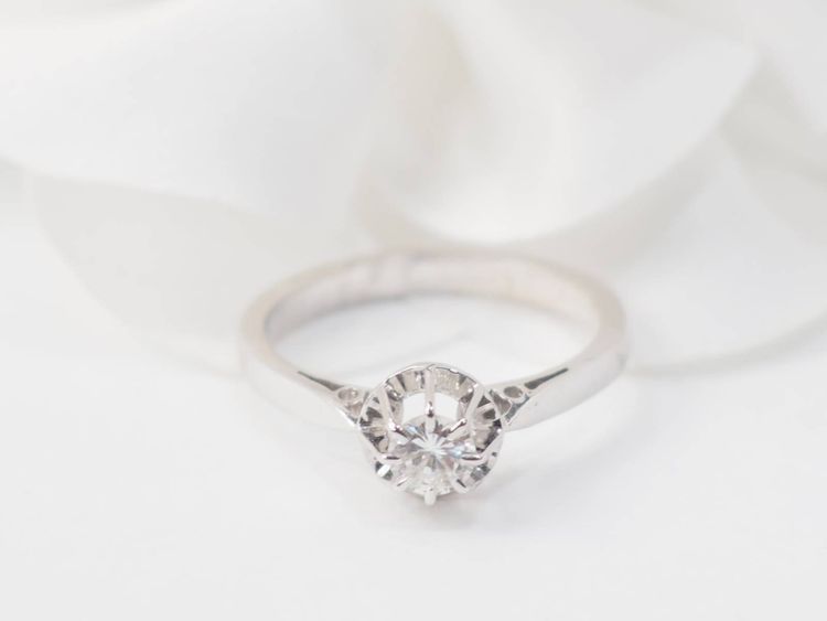 Solitaire in white gold and 0.23ct diamond
