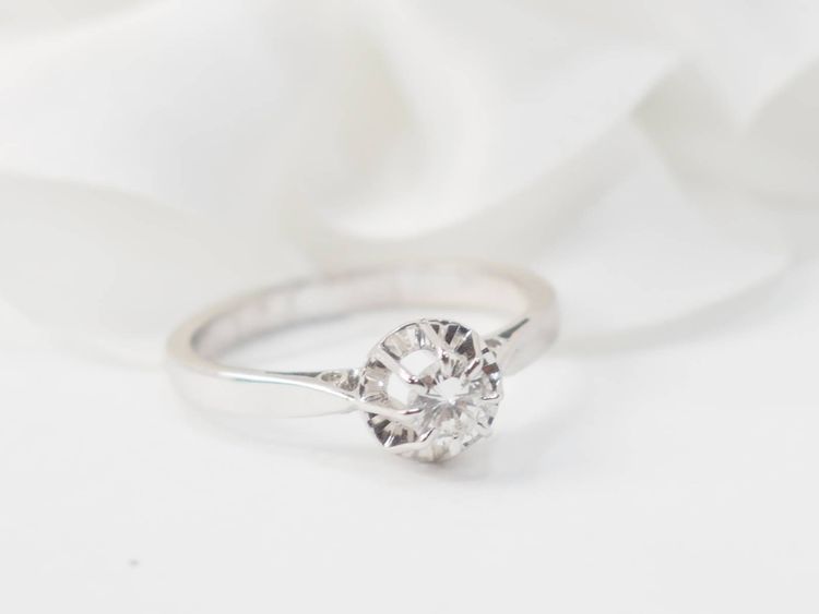 Solitaire in white gold and 0.23ct diamond