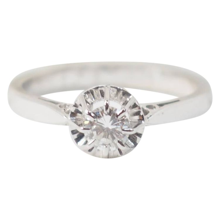 Solitaire in white gold and 0.23ct diamond