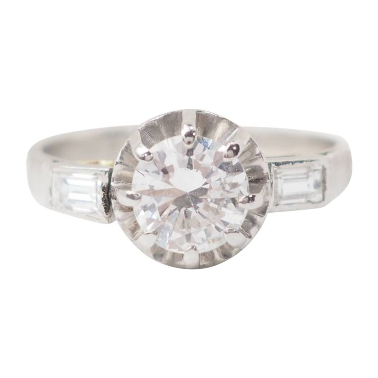 Anello solitario in oro bianco e diamanti